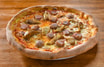 Pizza mit Steinpilzen und Salsiccia