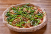 Pizza mit Lachs und Rucola